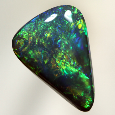 SOLID BLACK OPAL Bright golden gem fire SEE VIDEO
